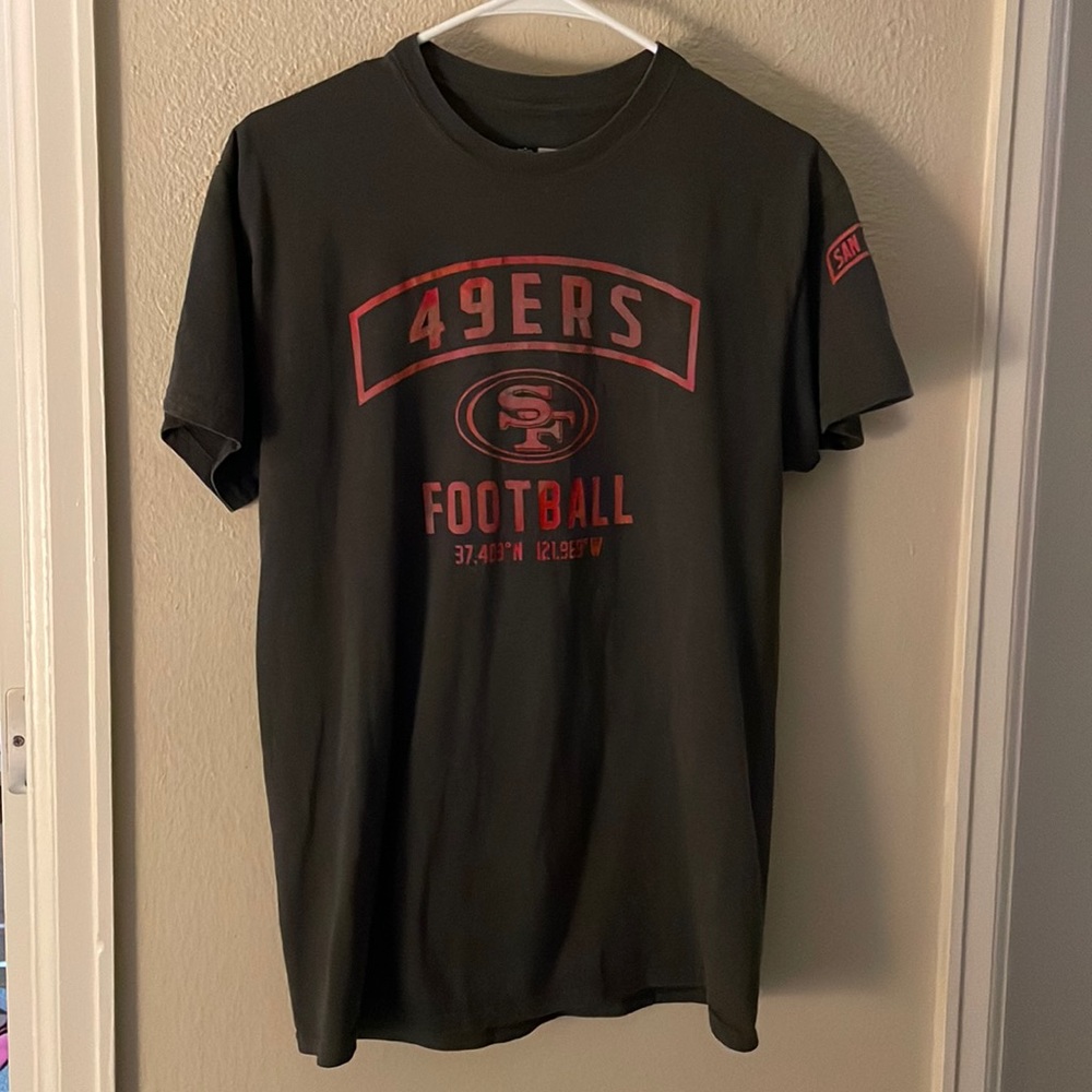 Selling this football team T shirt not asking for much willing to take offers